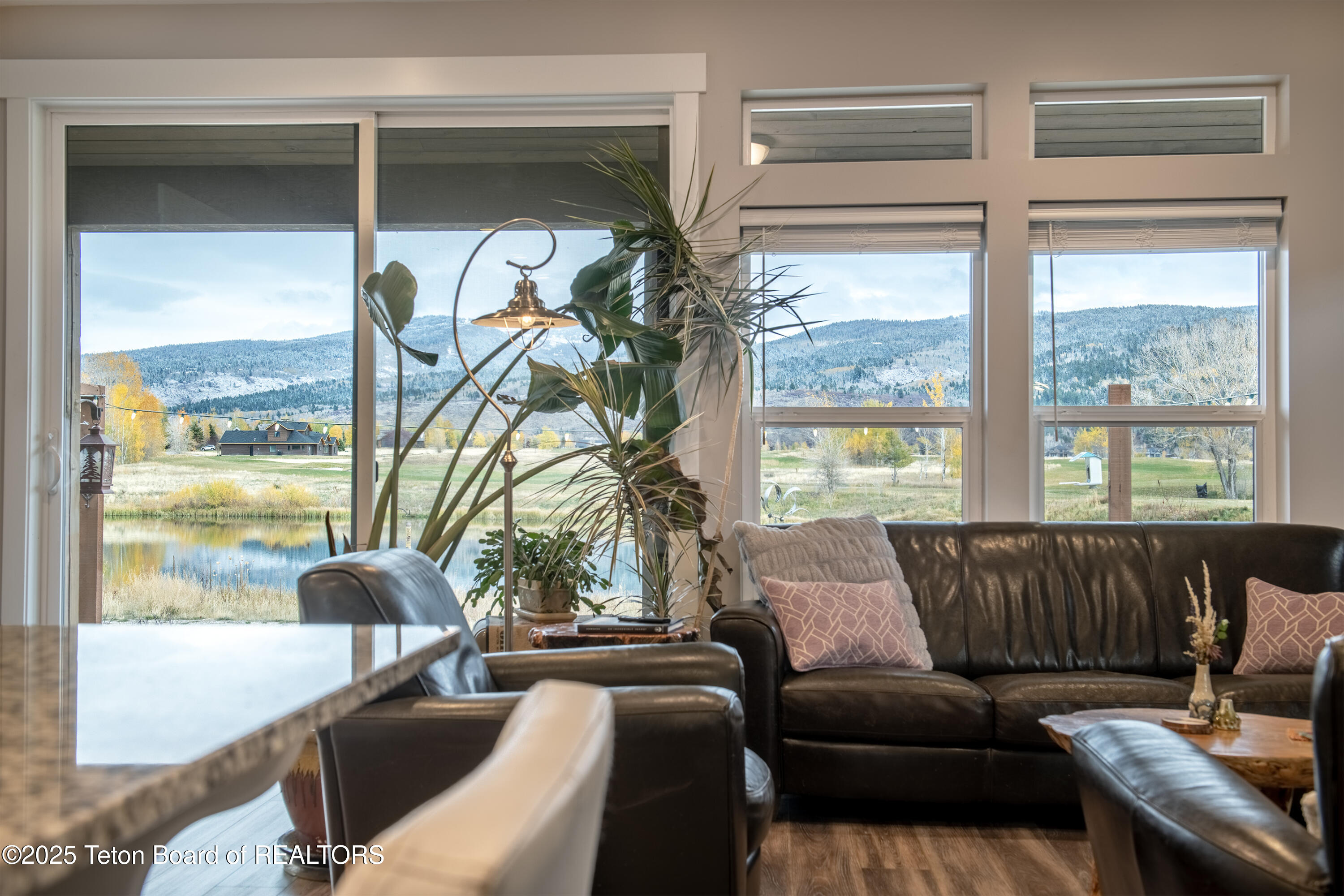 146 Swallowtail Drive Victor, ID 83455 - Photo 12 of 42 11 pond view from Kitchen bar