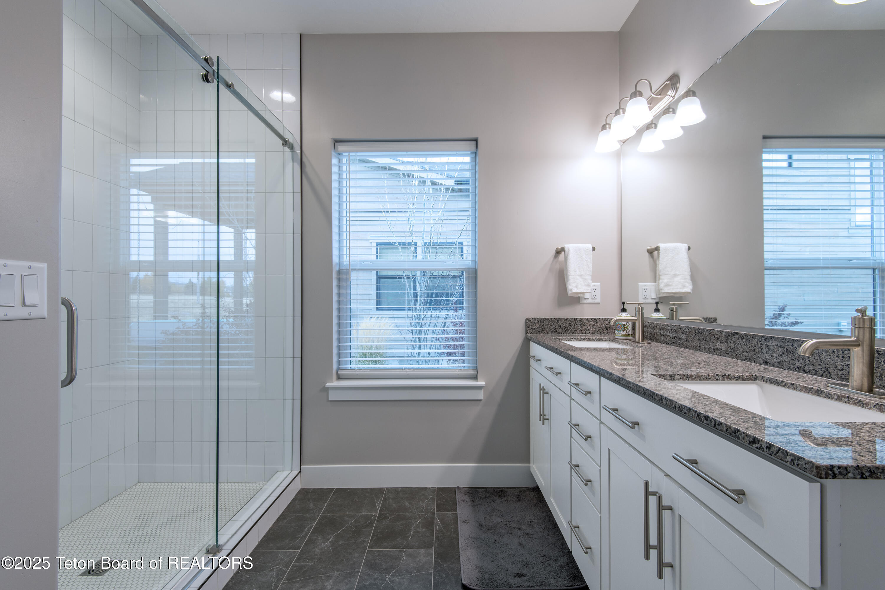 146 Swallowtail Drive Victor, ID 83455 - Photo 19 of 42 18 Primary Bathroom vanity
