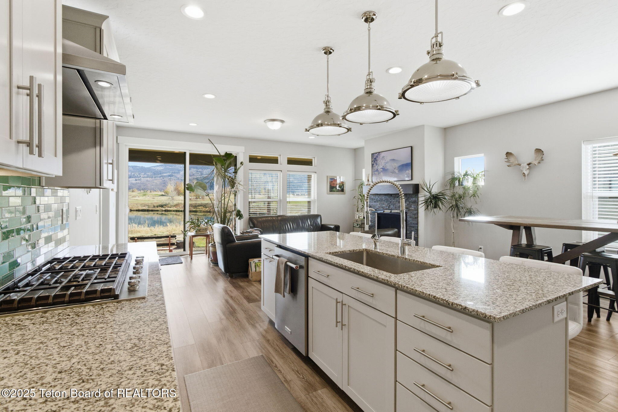 146 Swallowtail Drive Victor, ID 83455 - Photo 4 of 42 4 kitchen looking east