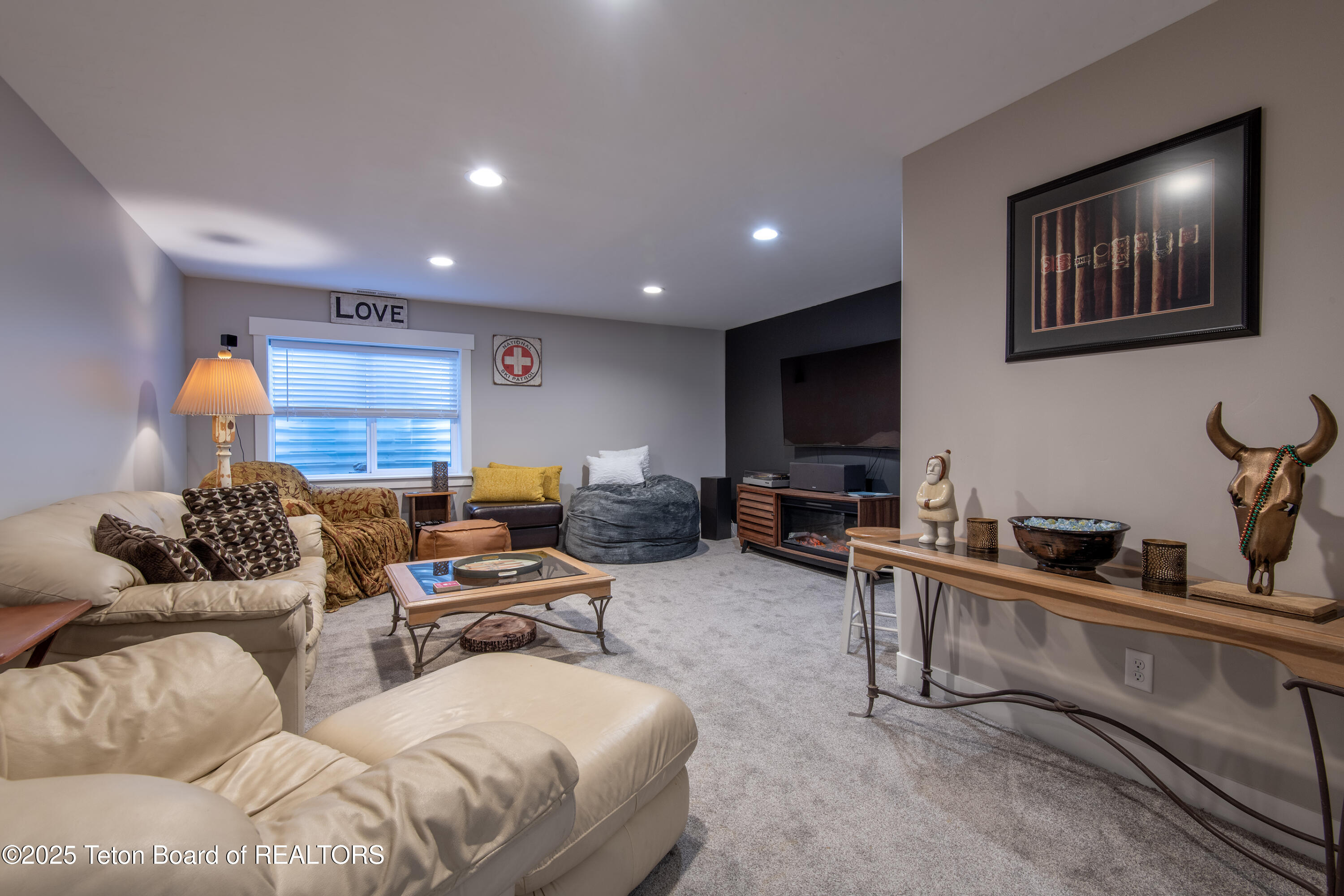 146 Swallowtail Drive Victor, ID 83455 - Photo 9 of 42 8 TV room electric fireplace under TV