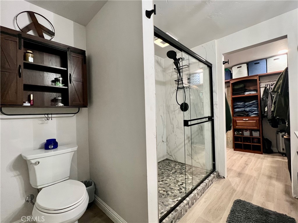 7541 Humboldt Road Butte Meadows, CA 95942 - Photo 16 of 25 a bathroom with a toilet and a shower