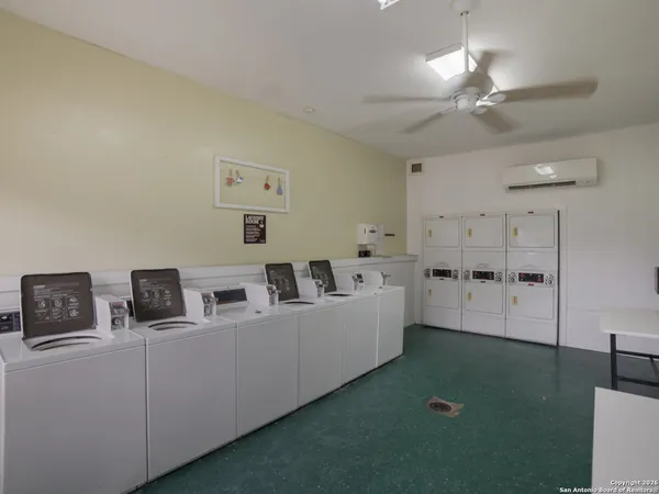 a room with a bed and furniture