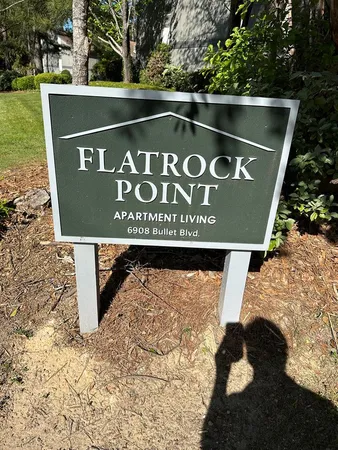 a sign broad on the side of the road