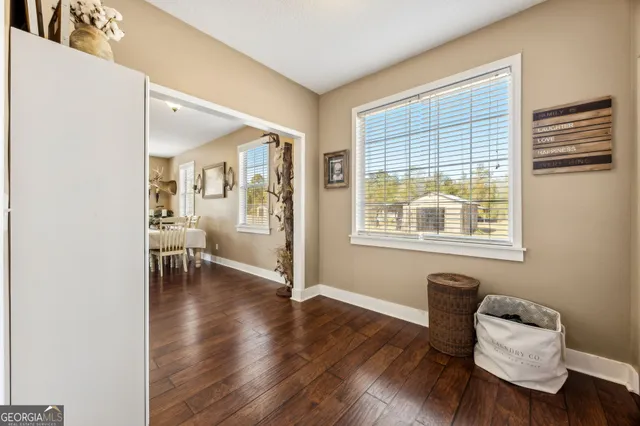 a bed room with a bed and a window