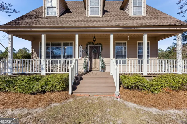 a front view of a house with a porch