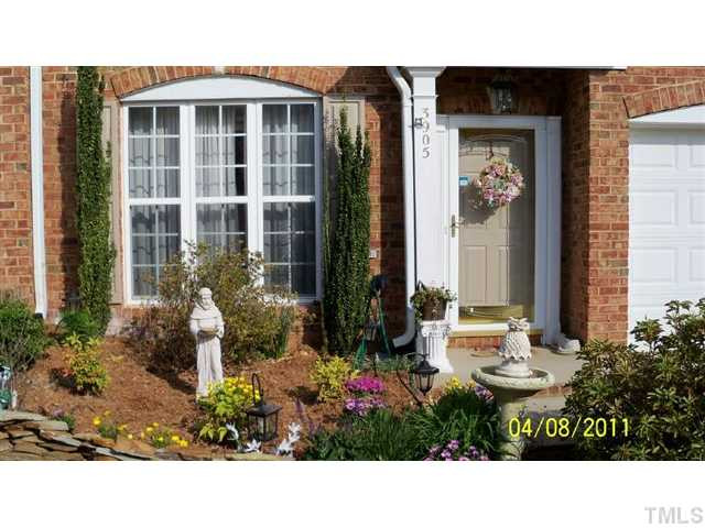3905 Sunset Maple Court Raleigh, NC 27612 - Photo 2 of 19 View of lovely garden area as you enter the home.