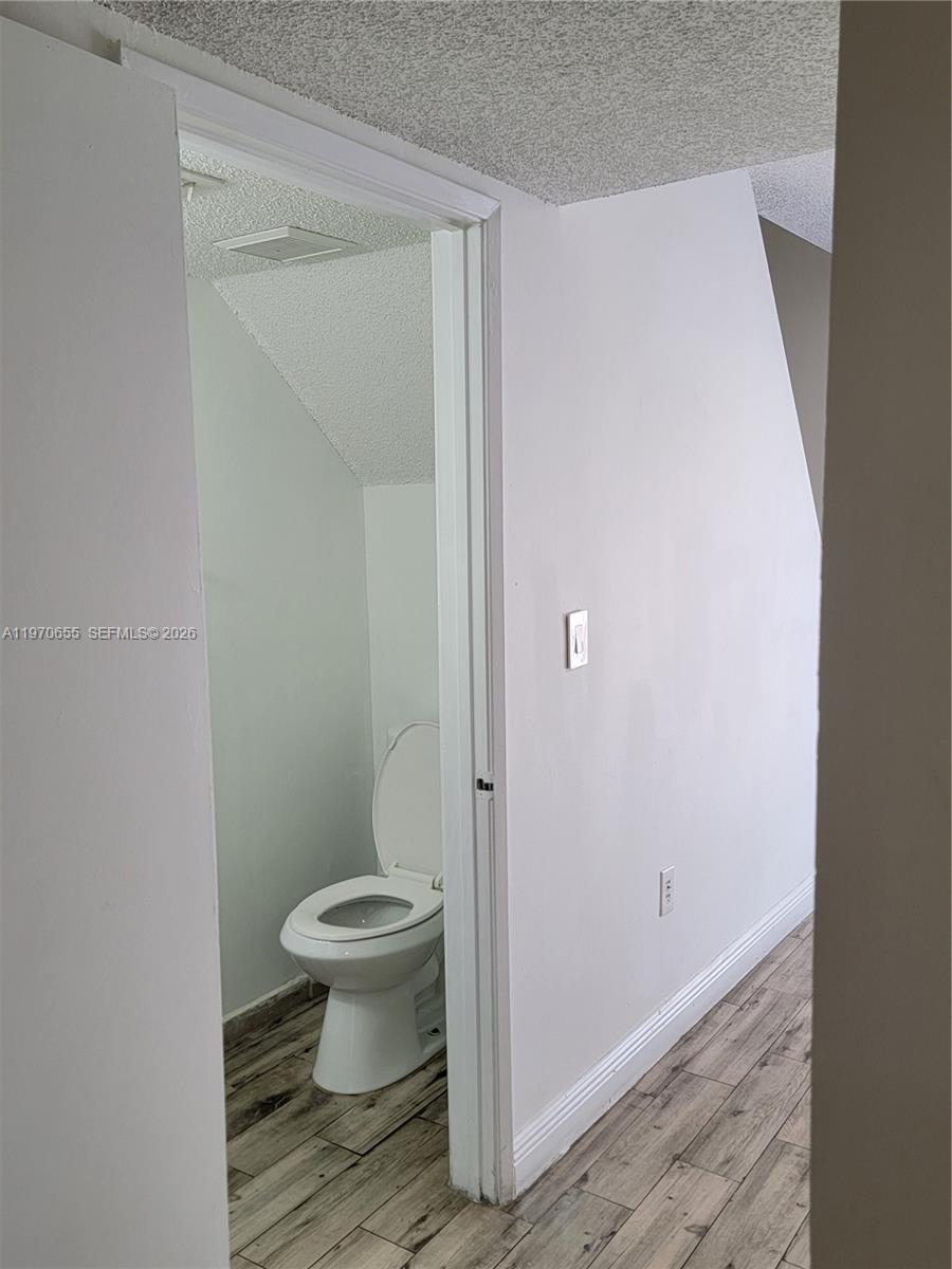 8250 Southwest 149th Court, Unit 8210 Miami, FL 33193 - Photo 11 of 23 a bathroom with a toilet