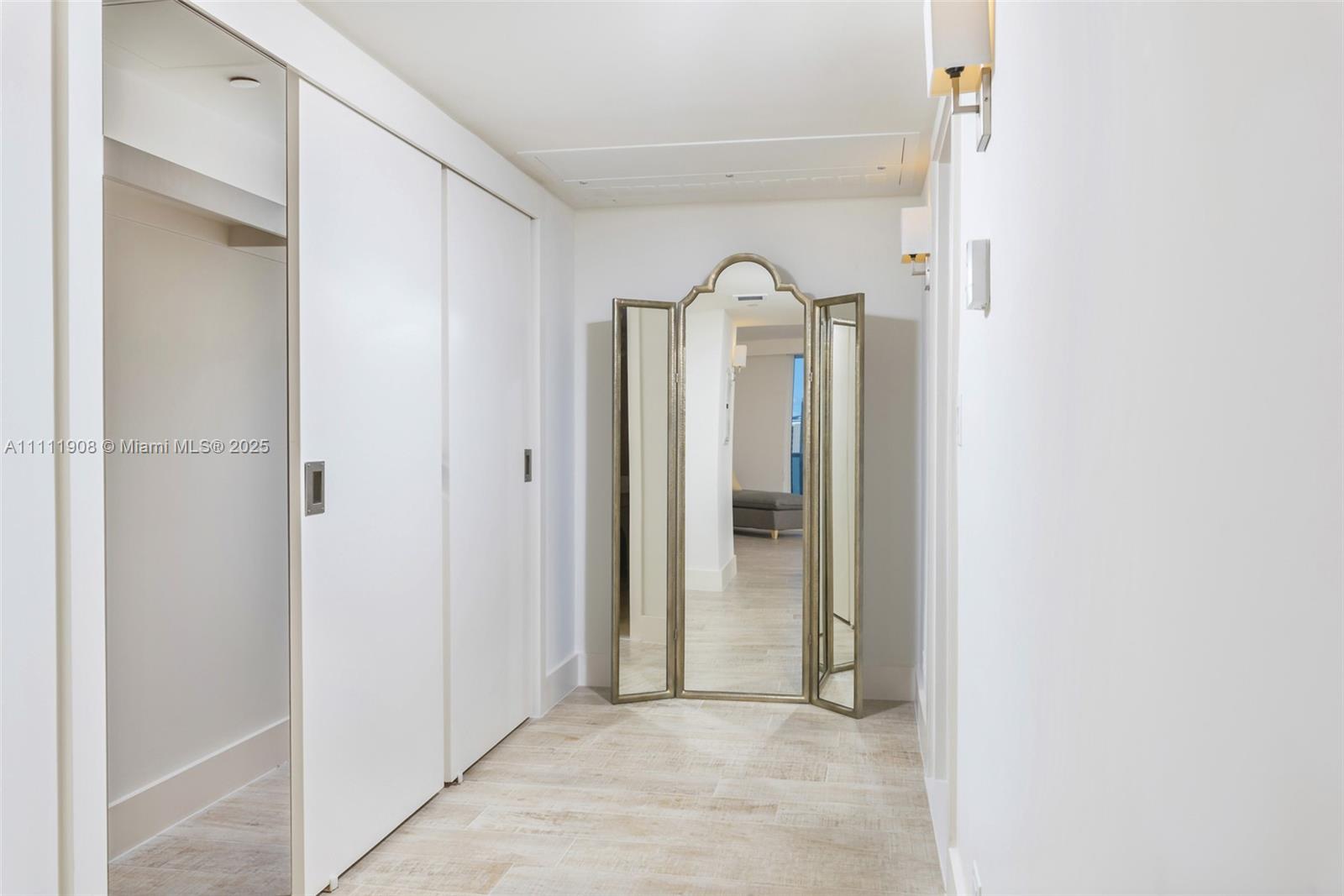 102 24th Street, Unit 1019 Miami Beach, FL 33139 - Photo 21 of 27 a view of a bathroom with mirror