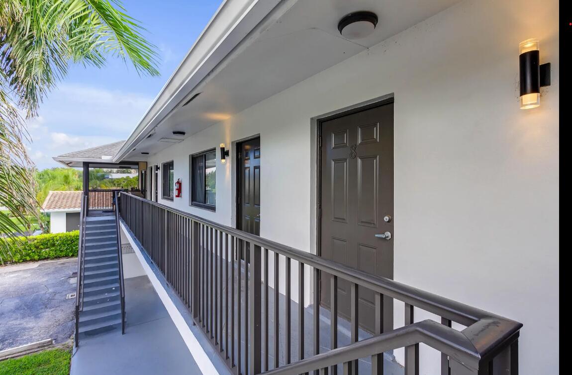 520 Northeast 44th Street, Unit 6 Boca Raton, FL 33431 - Photo 4 of 6 a view of a balcony