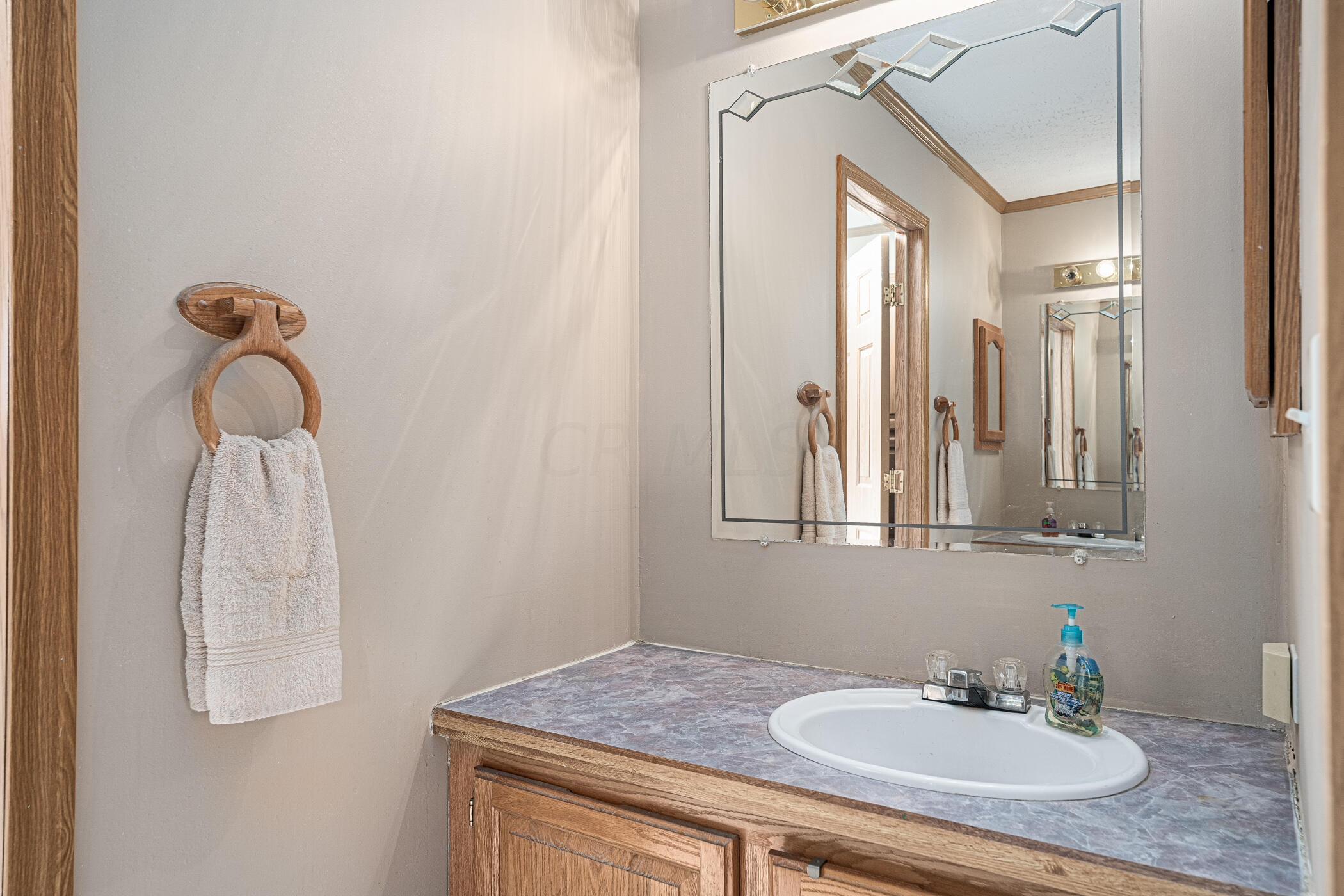15913 Rocky Fork Road Logan, OH 43138 - Photo 45 of 47 Half bathroom off mudroom