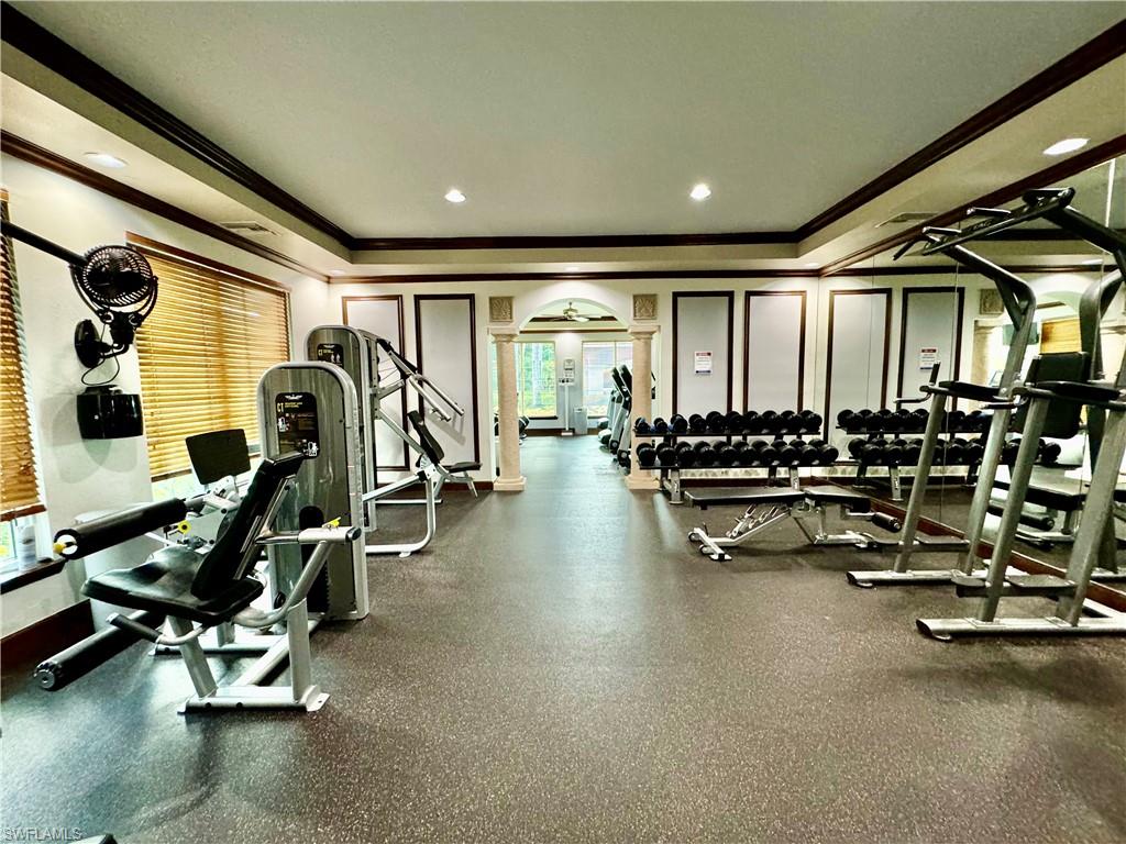 1200 Reserve Way, Unit 103 Naples, FL 34105 - Photo 19 of 26 a view of a room with gym equipment