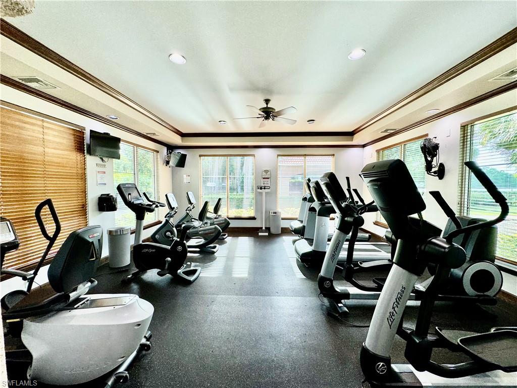 1200 Reserve Way, Unit 103 Naples, FL 34105 - Photo 20 of 26 a view of a room with gym equipment