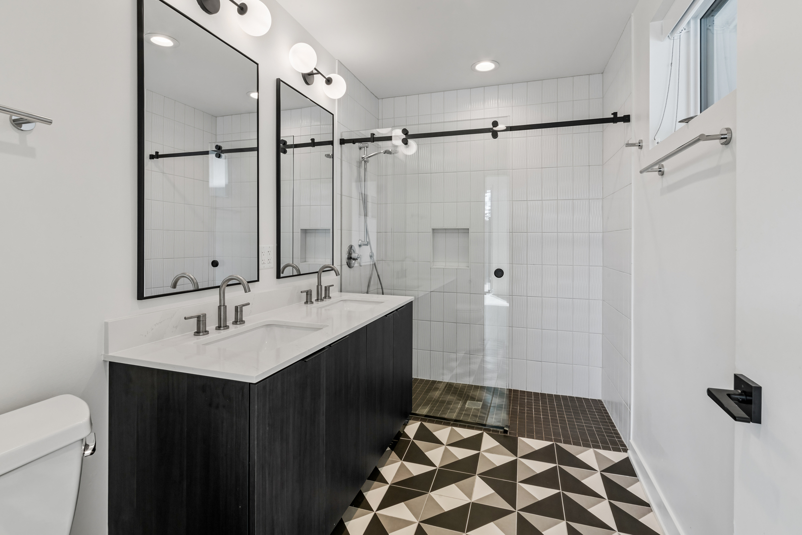 1801 West Grand Avenue, Unit 202 Chicago, IL 60622 - Photo 10 of 16 a bathroom with a sink and a mirror
