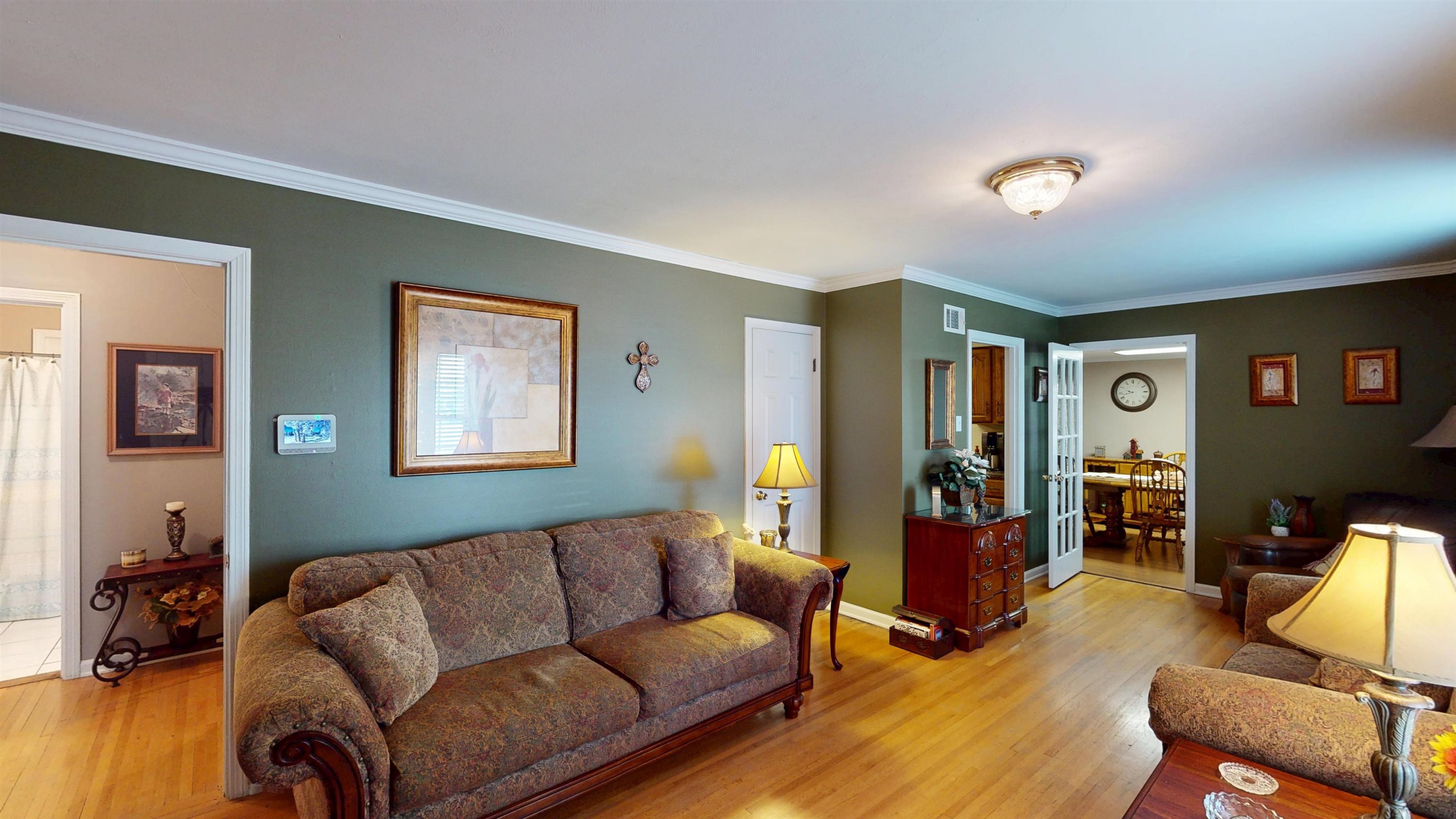 897 Bartlett Road Memphis, TN 38122 - Photo 4 of 33 a living room with furniture and a flat screen tv