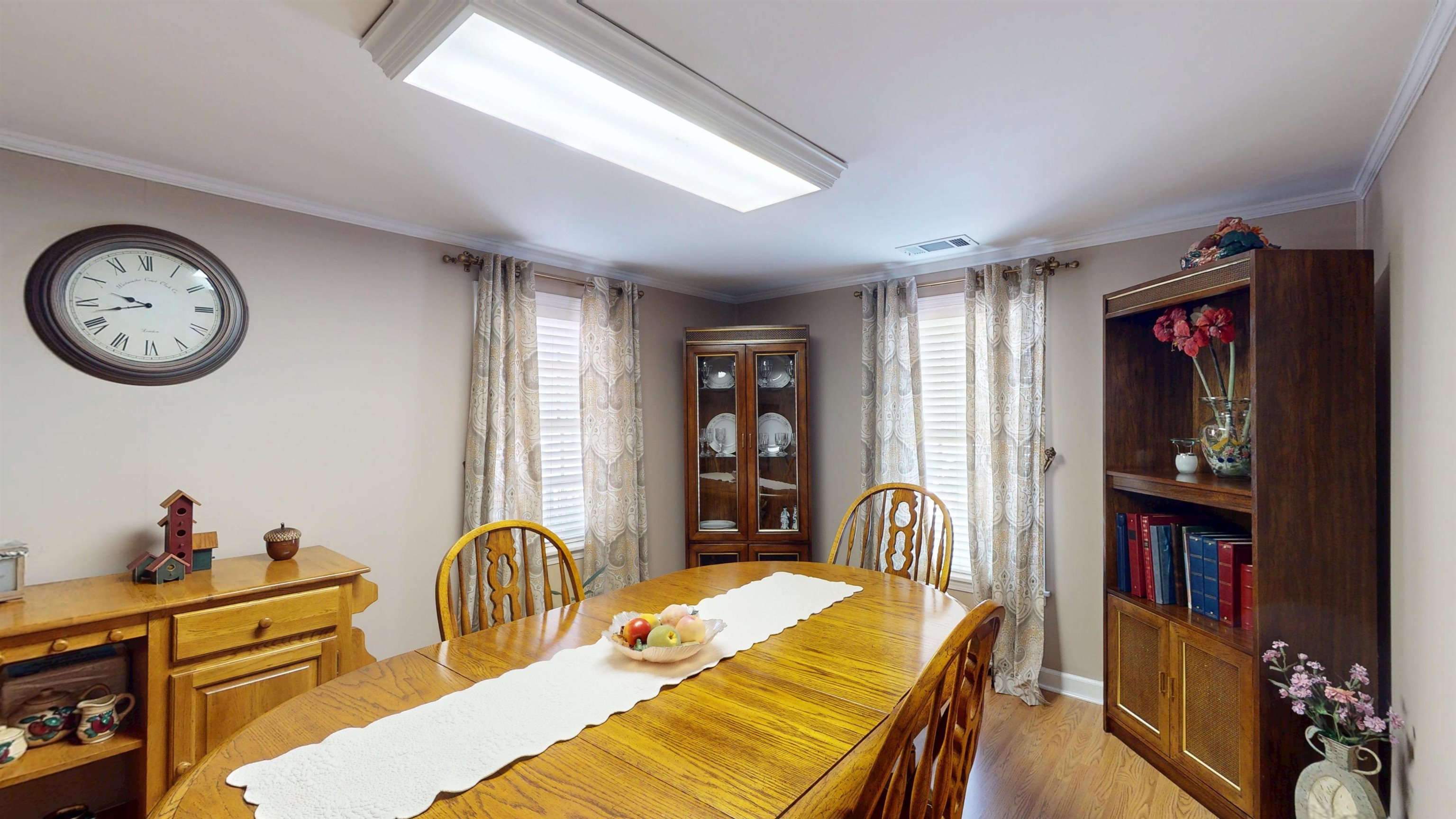 897 Bartlett Road Memphis, TN 38122 - Photo 5 of 33 a bed room with a bed and a book shelf