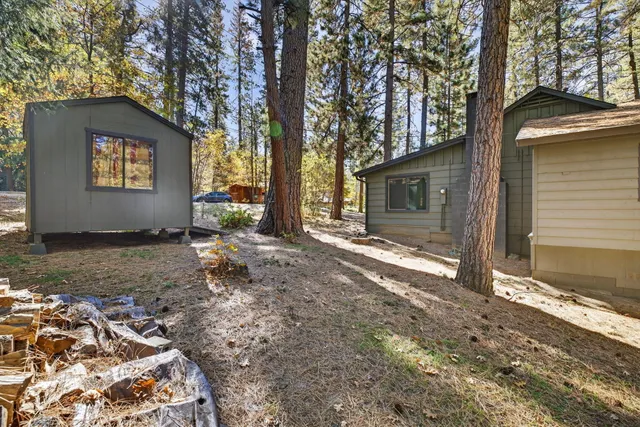 a backyard of a house with lots of green space