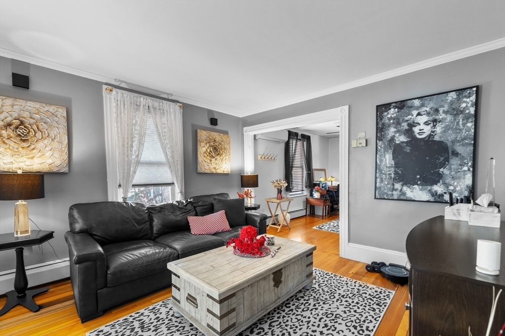 7 Adams Avenue Saugus, MA 01906 - Photo 13 of 38 a living room with furniture and a window