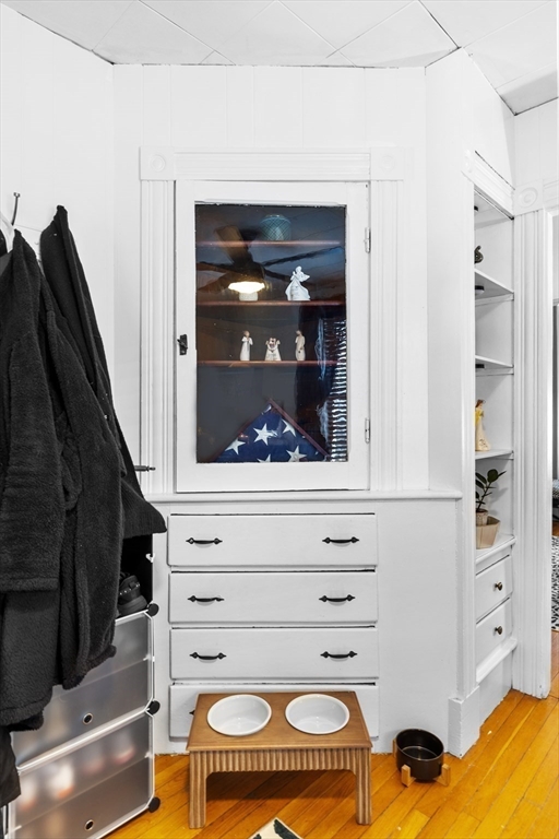7 Adams Avenue Saugus, MA 01906 - Photo 19 of 38 a view of walk in closet with clothes and shoes