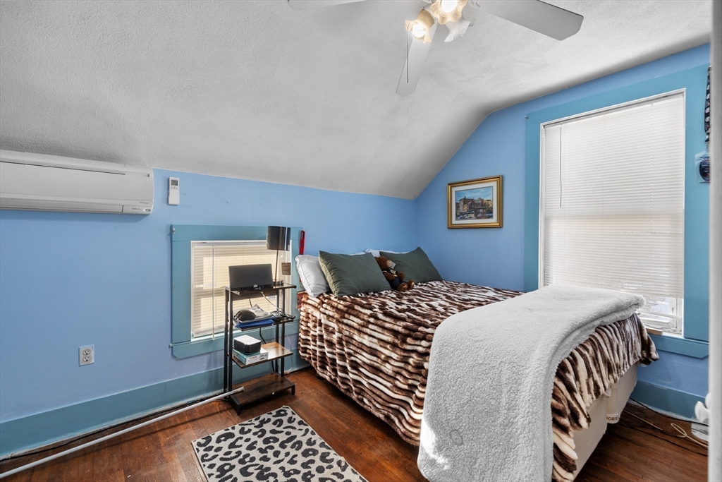 7 Adams Avenue Saugus, MA 01906 - Photo 25 of 38 a bedroom with a bed and a window