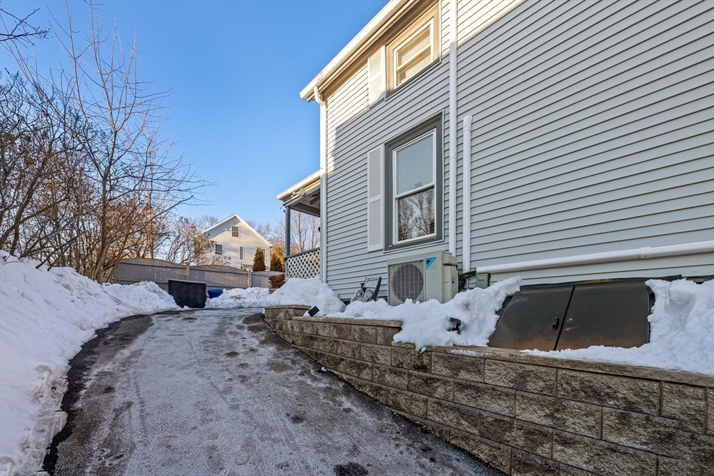 7 Adams Avenue Saugus, MA 01906 - Photo 33 of 38 a front view of a house with garden