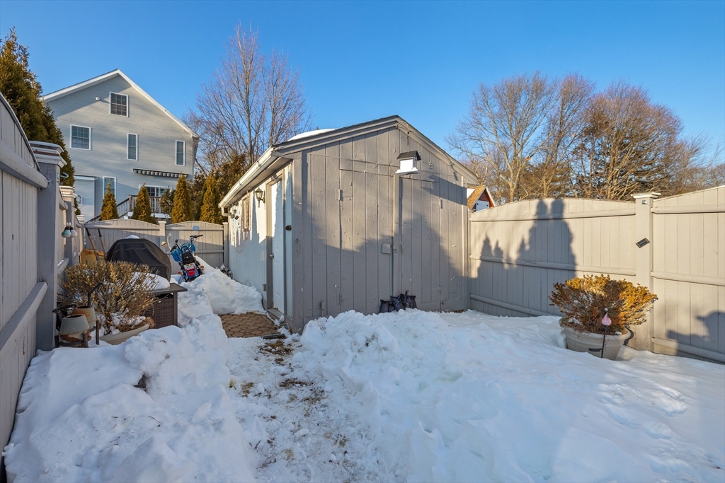 7 Adams Avenue Saugus, MA 01906 - Photo 38 of 38 a view of a house with a snow in the background