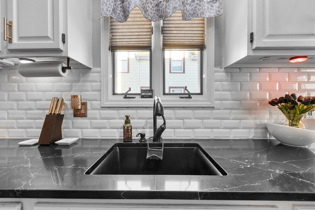 7 Adams Avenue Saugus, MA 01906 - Photo 10 of 38 a kitchen with a sink and a window