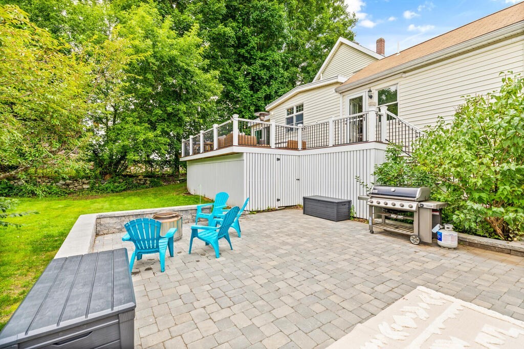 45 Spring Street Stoneham, MA 02180 - Photo 28 of 30 a view of a chairs with a backyard