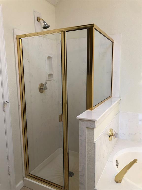 10350 Hampton Court Frisco, TX 75035 - Photo 16 of 27 a bathroom with a shower and a sink