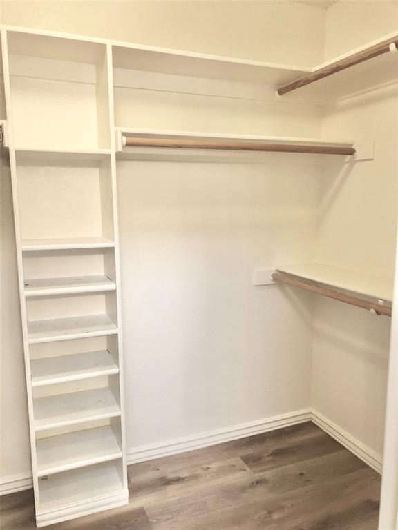 10350 Hampton Court Frisco, TX 75035 - Photo 18 of 27 a view of an empty walk in closet