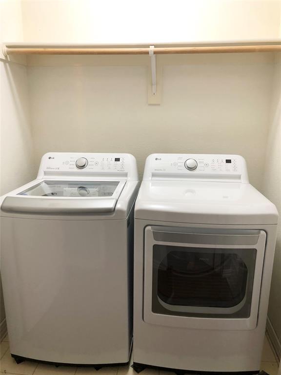 10350 Hampton Court Frisco, TX 75035 - Photo 22 of 27 a utility room with dryer and washer