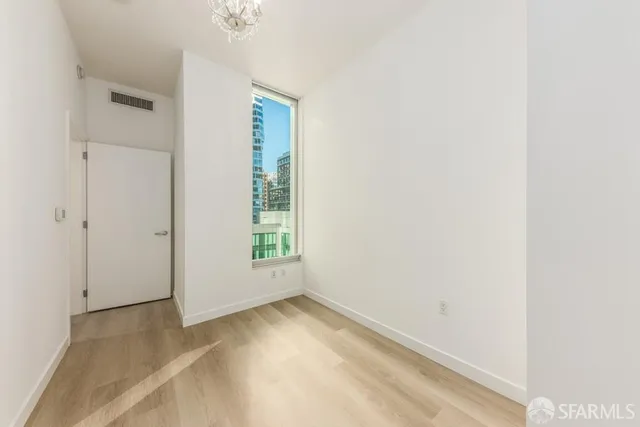 an empty room with windows