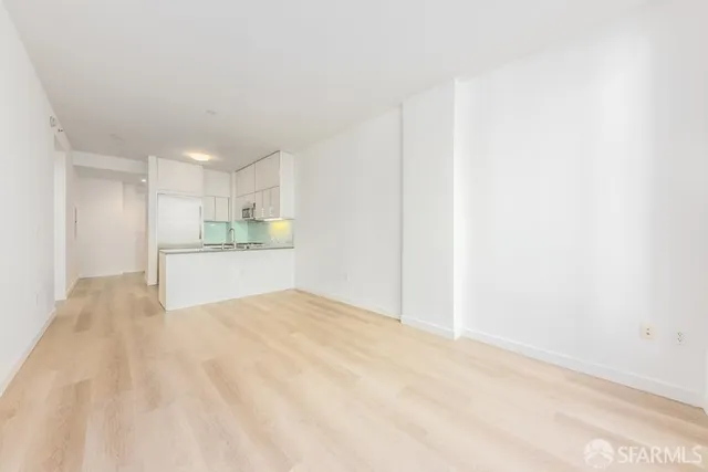 a view of a kitchen with a sink