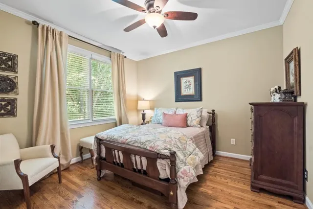 a view of balcony with furniture and wooden floor