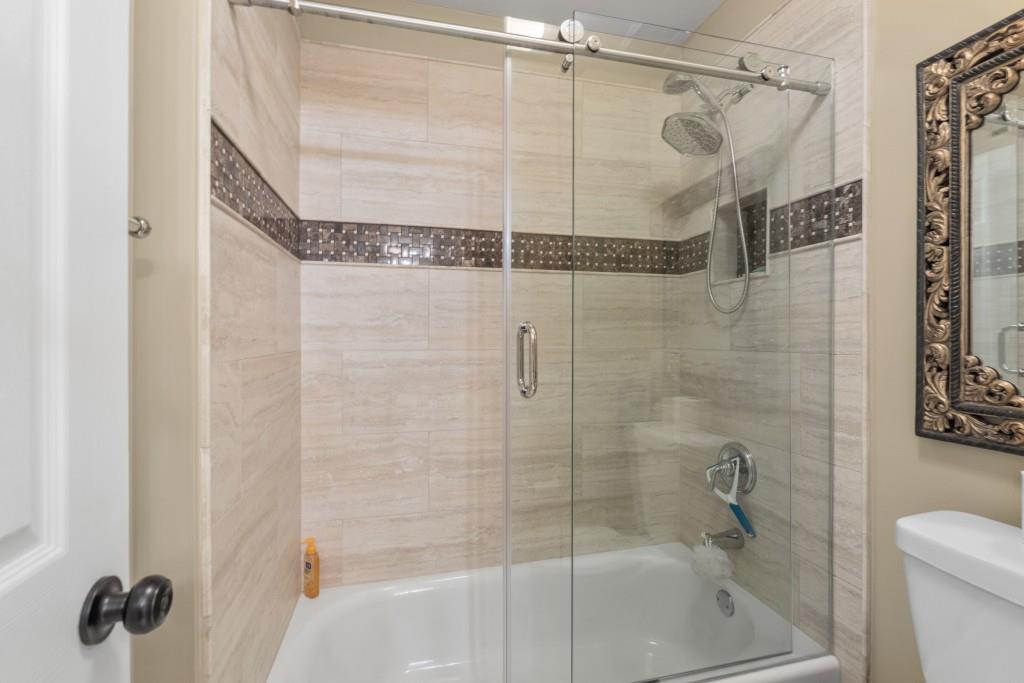 4140 River Bluff Run Way Suwanee, GA 30024 - Photo 37 of 83 a bathroom with a shower