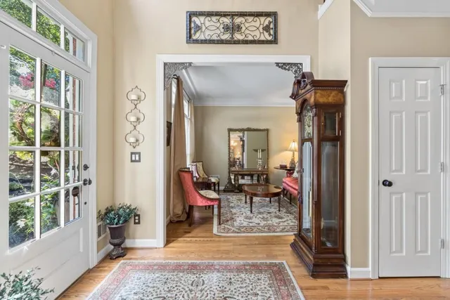 a kitchen with sink cabinets and wooden floor