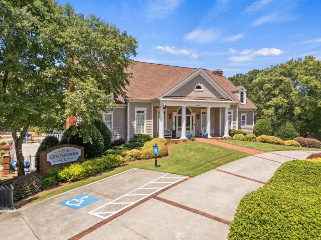 4140 River Bluff Run Way Suwanee, GA 30024 - Photo 76 of 83 a front view of a house with a yard