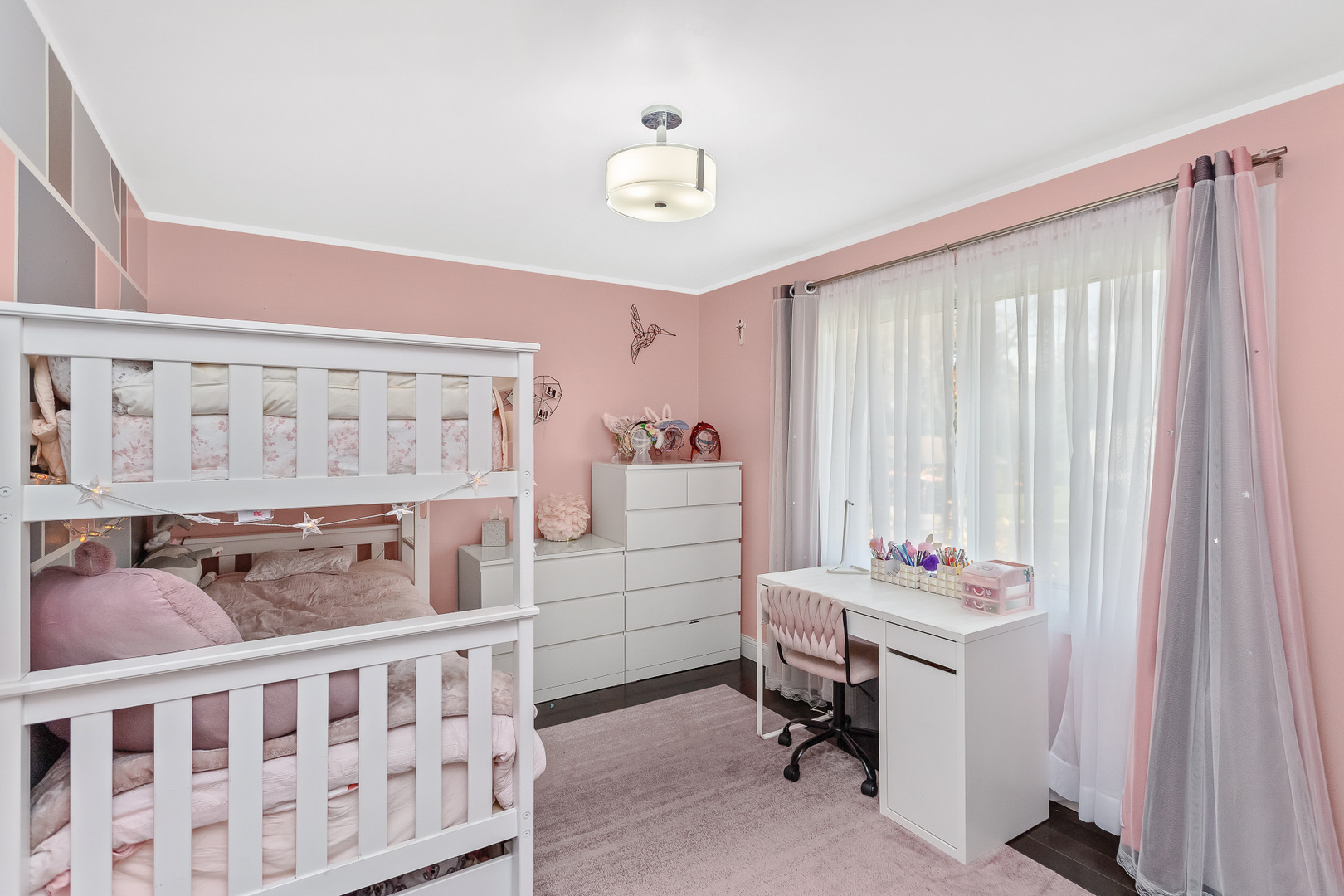 1585 West Oakmont Road Hoffman Estates, IL 60169 - Photo 13 of 25 a bedroom with a bed and a window