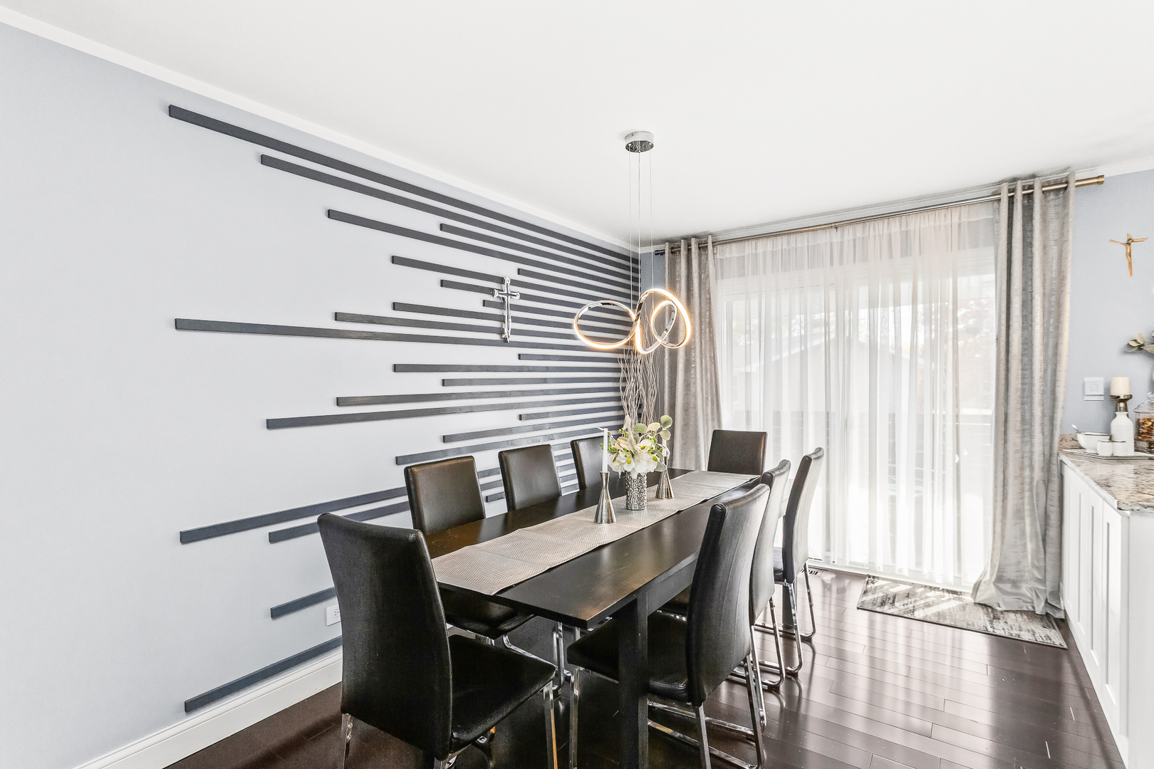 1585 West Oakmont Road Hoffman Estates, IL 60169 - Photo 5 of 25 a view of a dining room with furniture and wooden floor