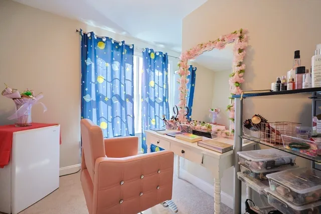 a room with furniture and a chandelier