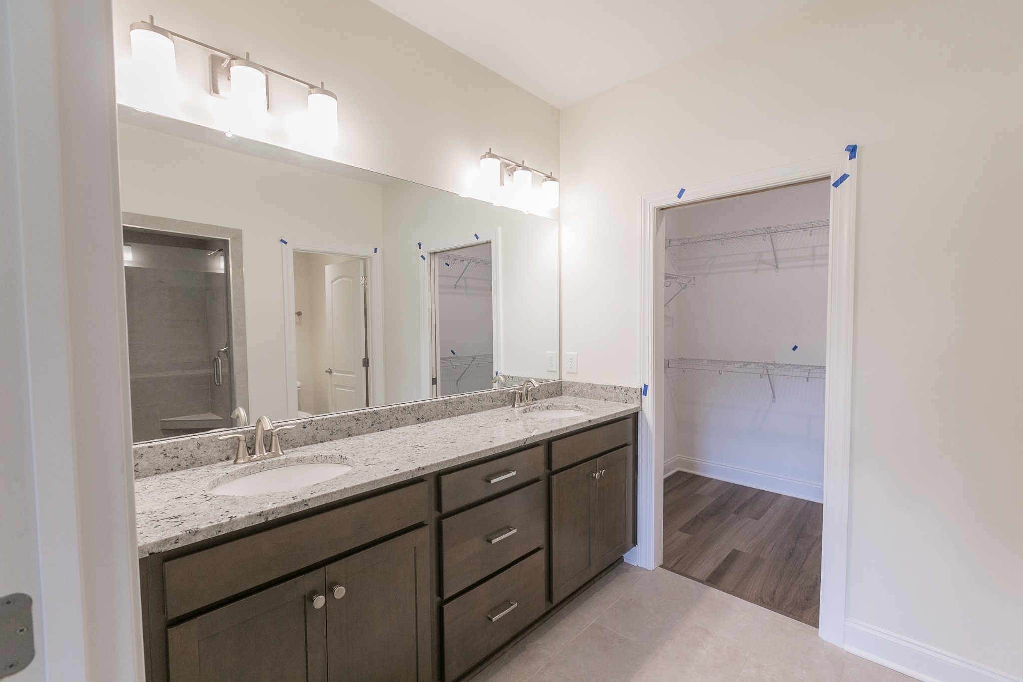 422 West Foxrun Springfield, TN 37172 - Photo 11 of 18 a bathroom with a granite countertop sink a mirror and a