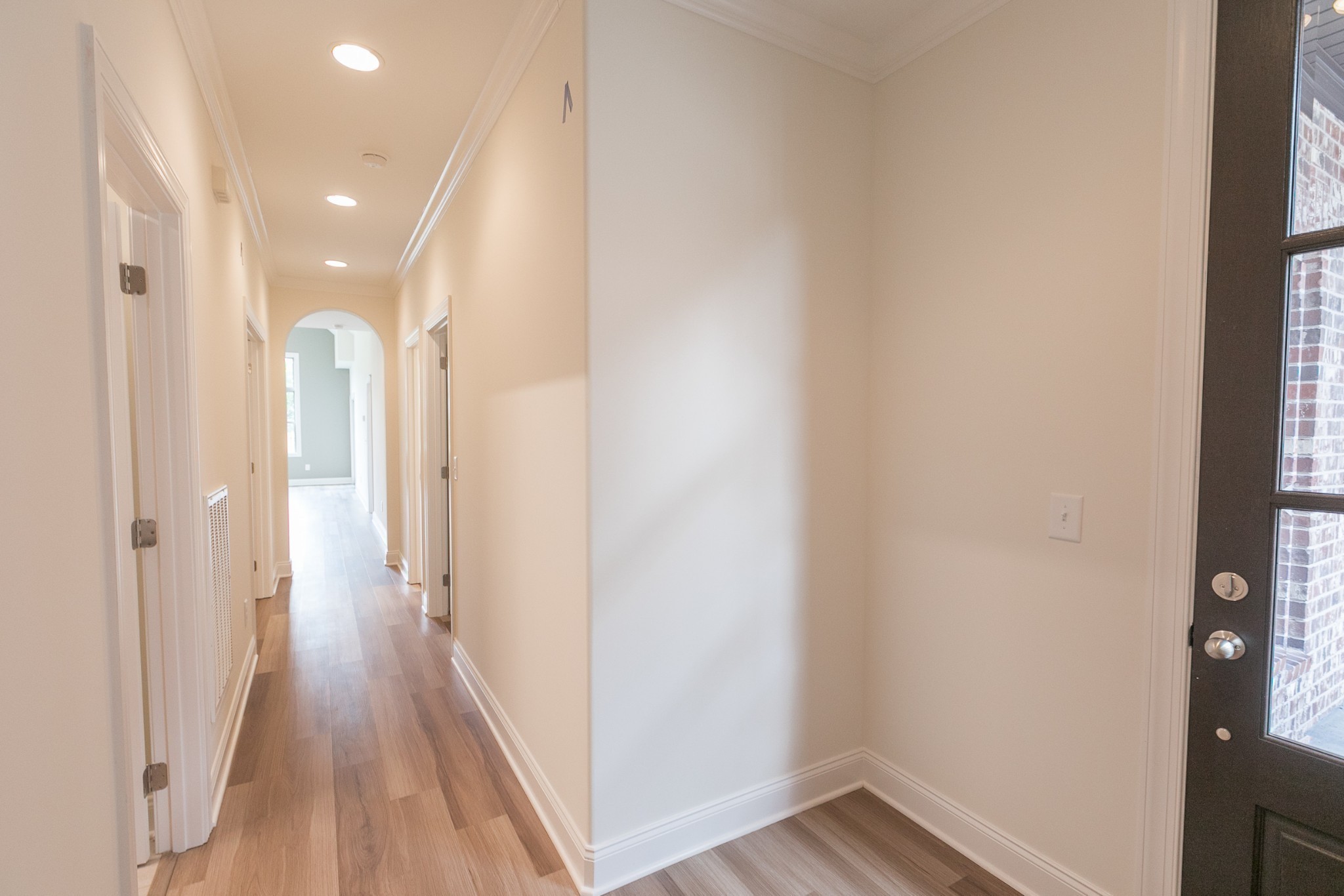 422 West Foxrun Springfield, TN 37172 - Photo 5 of 18 a view of a hallway with wooden floor and a bathroom
