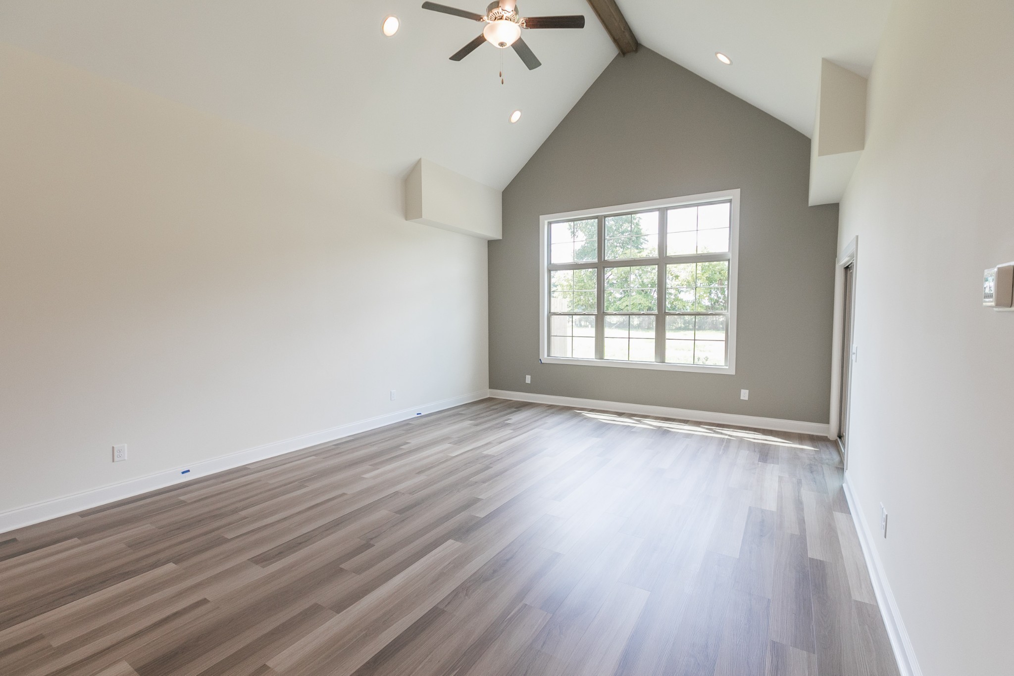 422 West Foxrun Springfield, TN 37172 - Photo 6 of 18 wooden floor in an empty room with a window