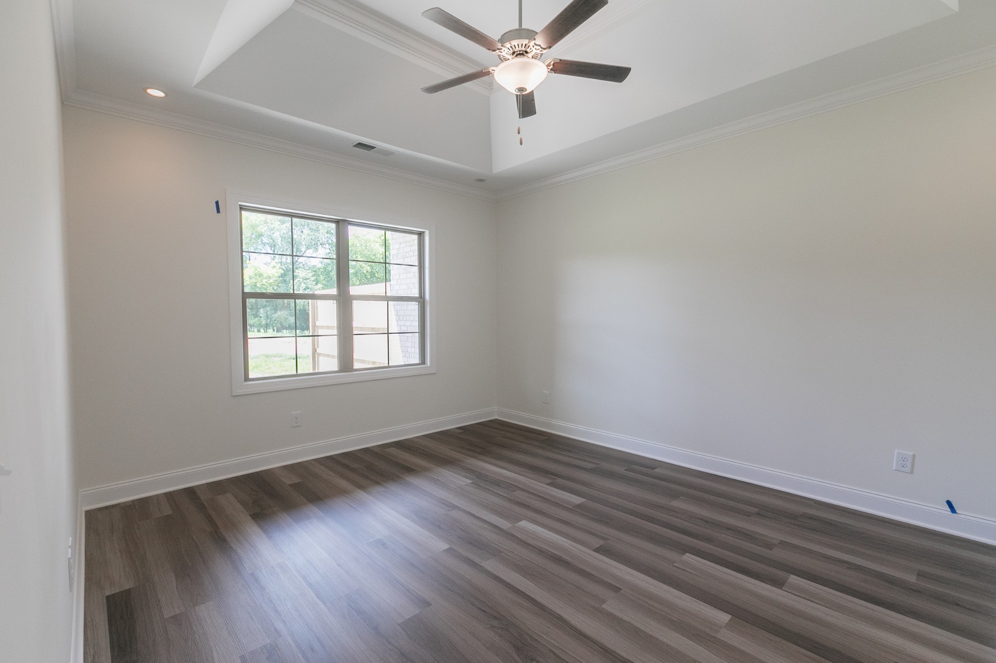 422 West Foxrun Springfield, TN 37172 - Photo 10 of 18 wooden floor in an empty room with a window