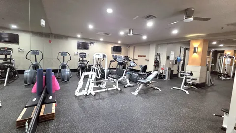 a view of a room with gym equipment