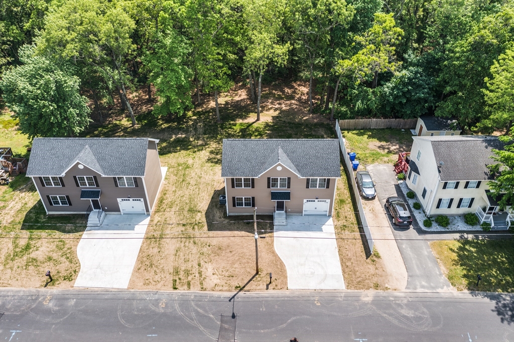 27 Jennings Street Springfield, MA 01119 - Photo 30 of 32 aerial view of a house with swimming pool