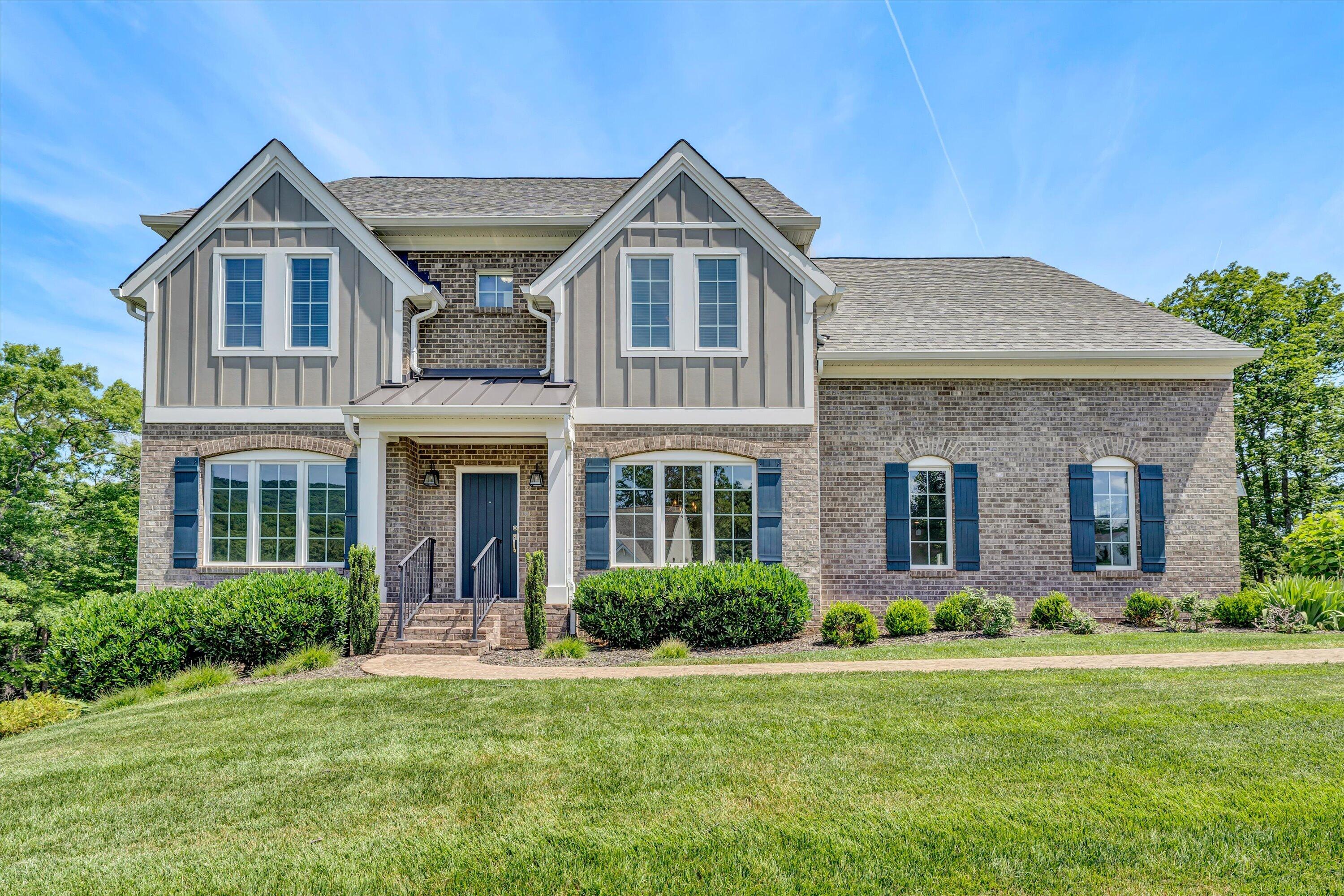 6981 Fairway Ridge Road Salem, VA 24153 - Photo 6 of 53 a front view of a house with a yard