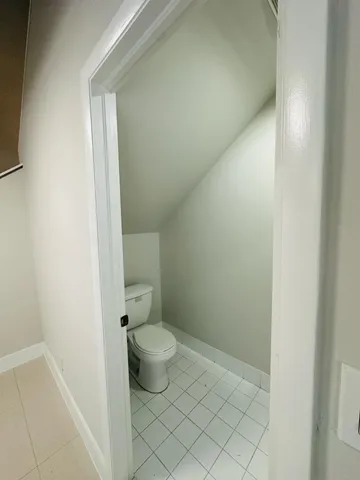 a bathroom with a toilet