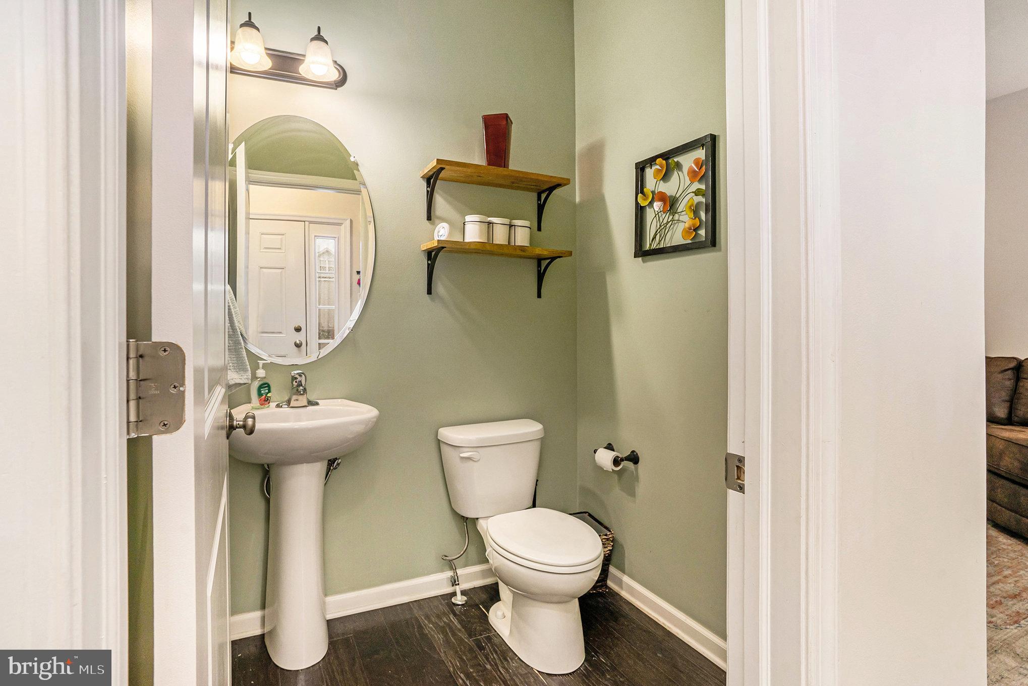 3611 Jacob Stout Road, Unit 8 Doylestown, PA 18902 - Photo 15 of 39 a bathroom with a toilet sink and mirror