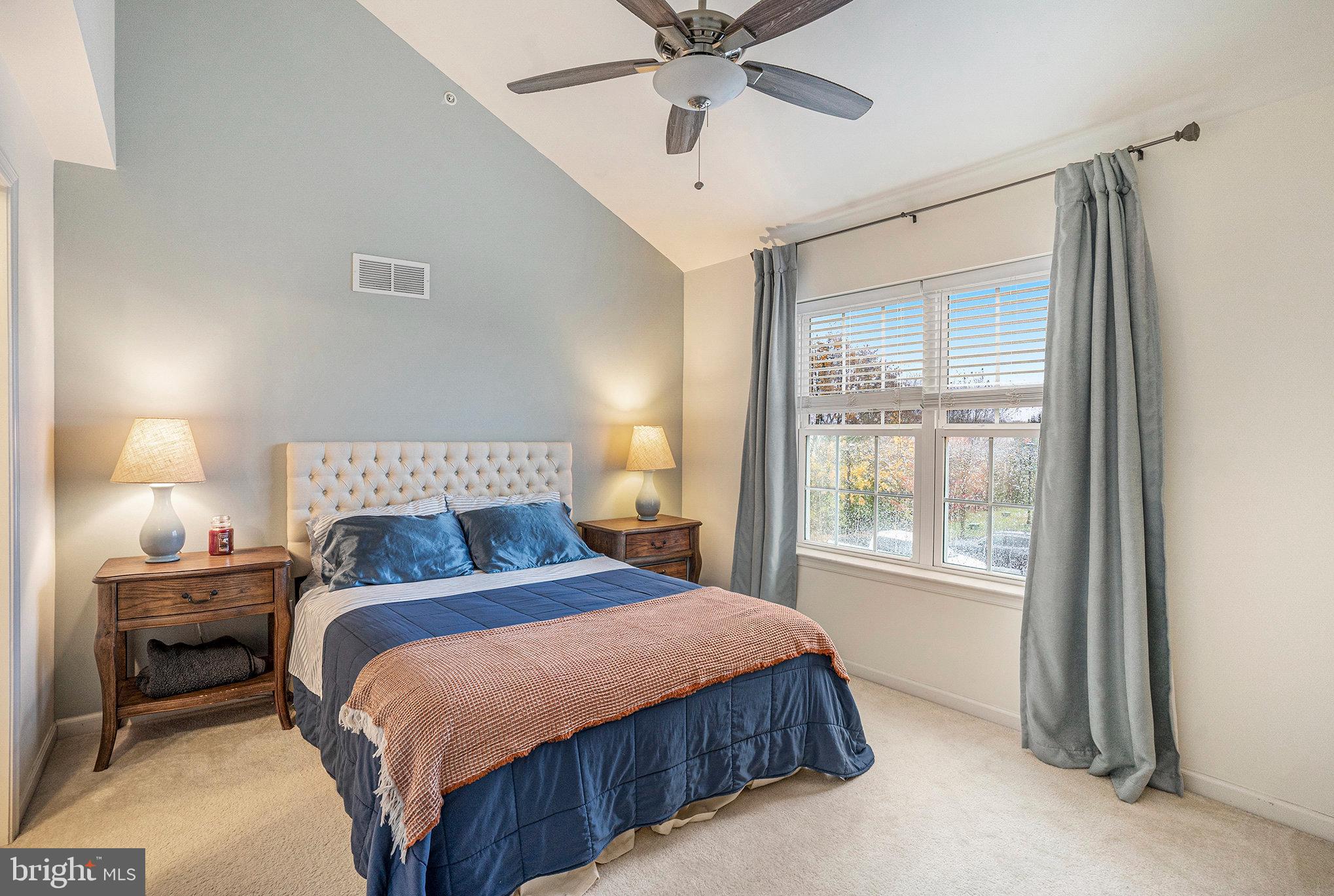 3611 Jacob Stout Road, Unit 8 Doylestown, PA 18902 - Photo 17 of 39 a bedroom with a large bed and a window