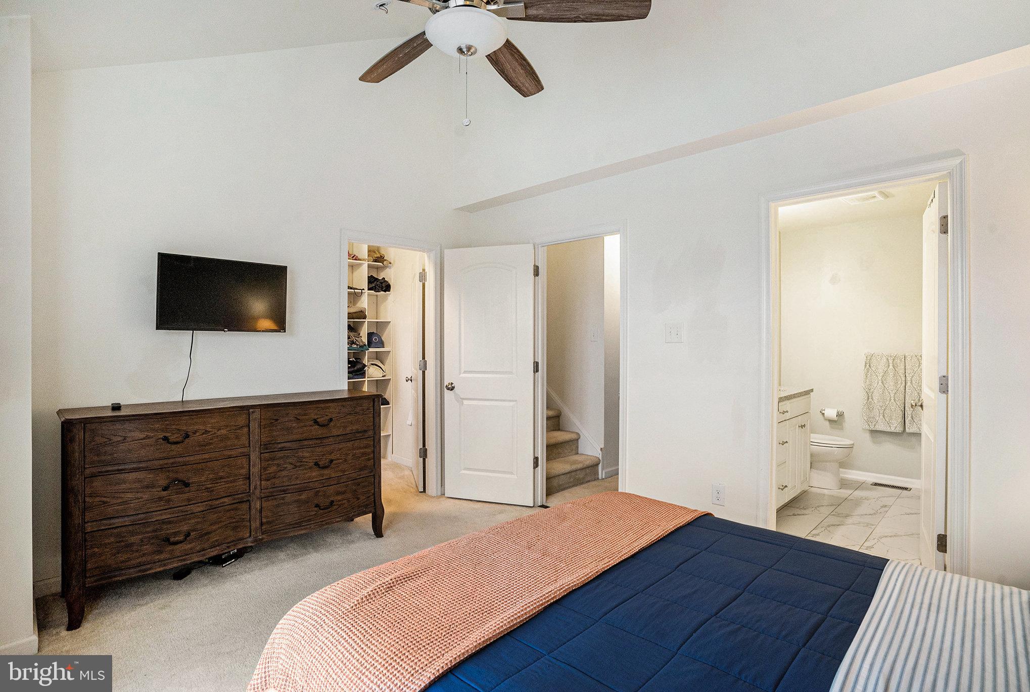 3611 Jacob Stout Road, Unit 8 Doylestown, PA 18902 - Photo 18 of 39 a bedroom with a bed and wooden floor